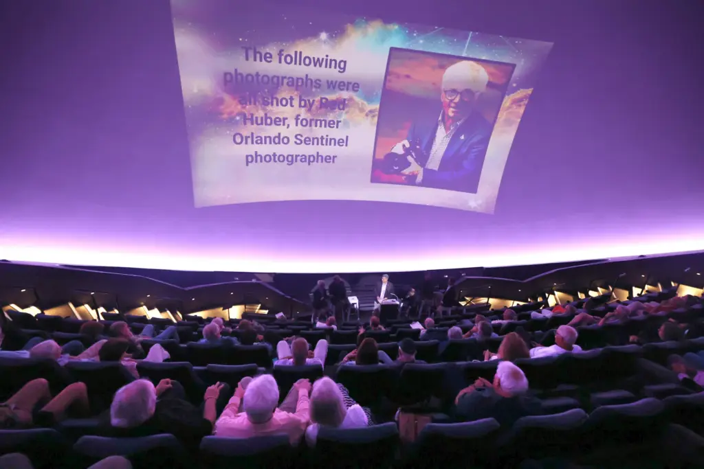 Photographs by Red Huber are shown during the Orlando Sentinel...