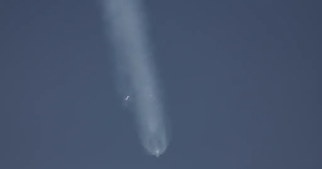 Boosters separate from the SpaceX Falcon Heavy rocket carrying NASA's...