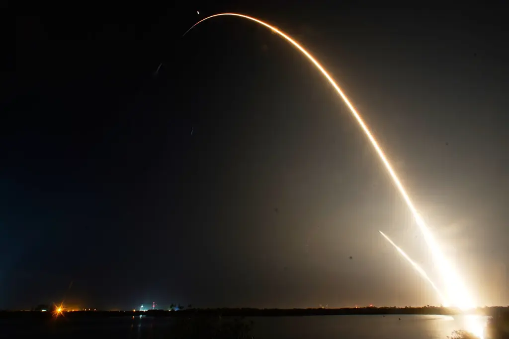 A SpaceX Falcon 9 rocket with a crew of four...