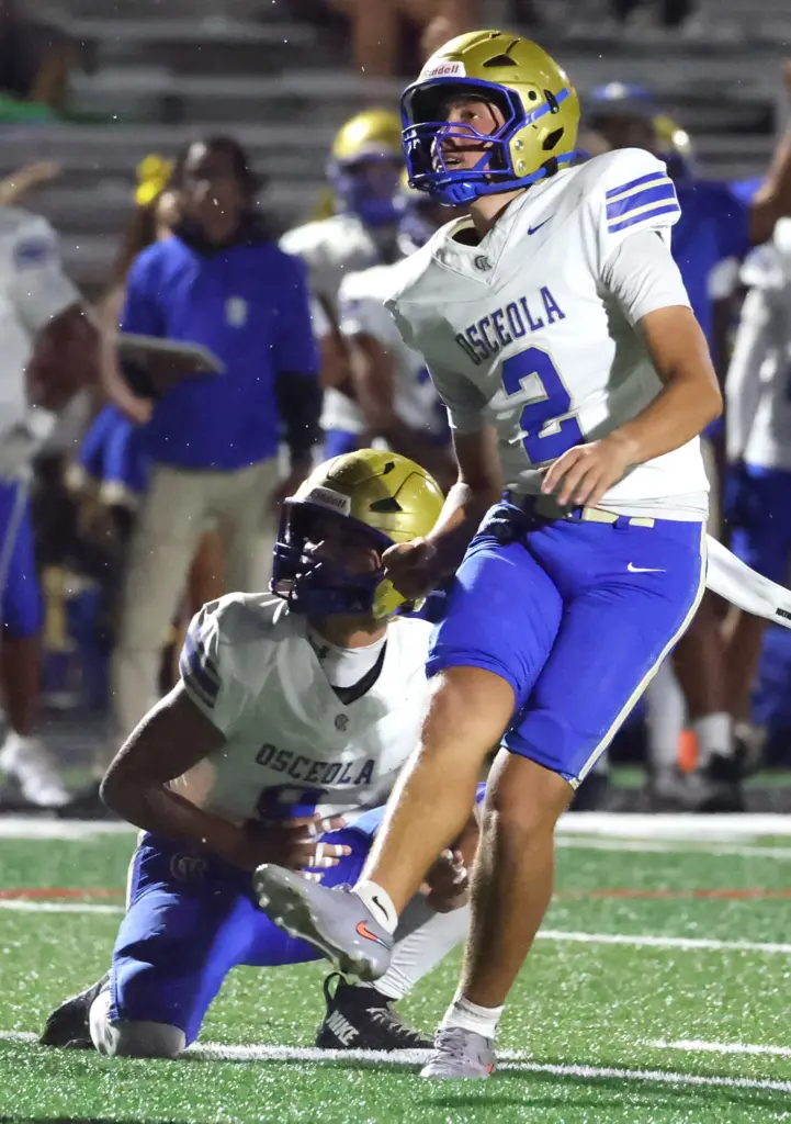Osceola kicker Brayden Buehler (2) kicks a field goal during...
