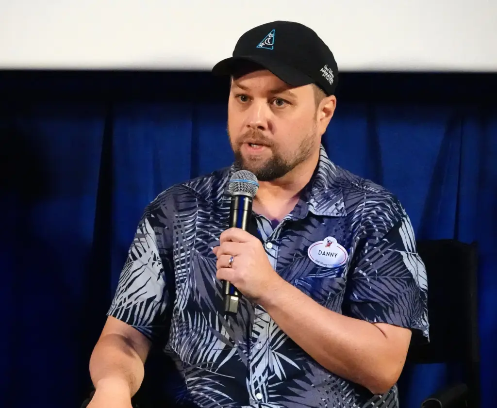 Walt Disney Imagineering Senior Creative Director Danny Handke answers a...