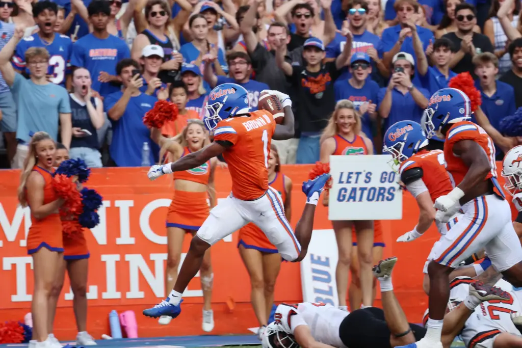 Florida receiver Vernell Brown III leaps into the endzone as...