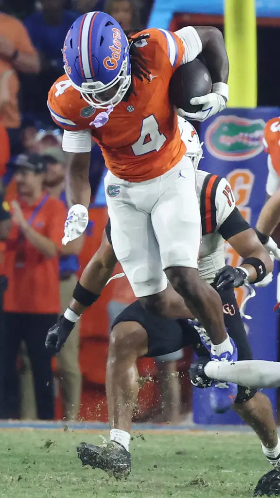 Florida wide receiver TJ Abrams (4) leaps during the Campbell...
