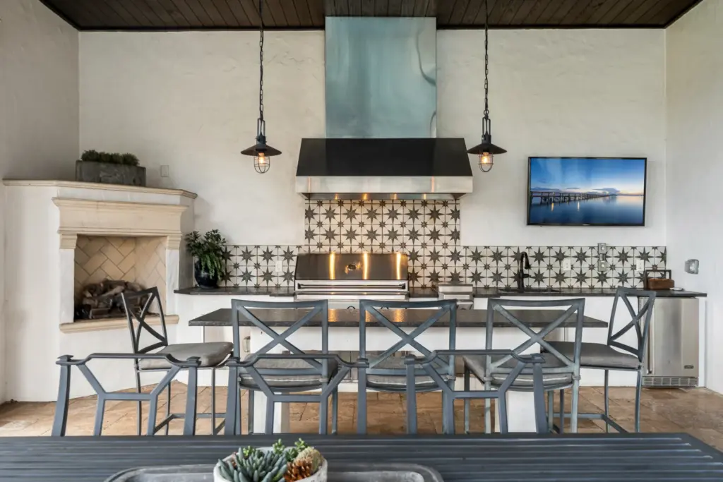 Outdoor entertaining spaces include multiple terraces and a covered lanai...