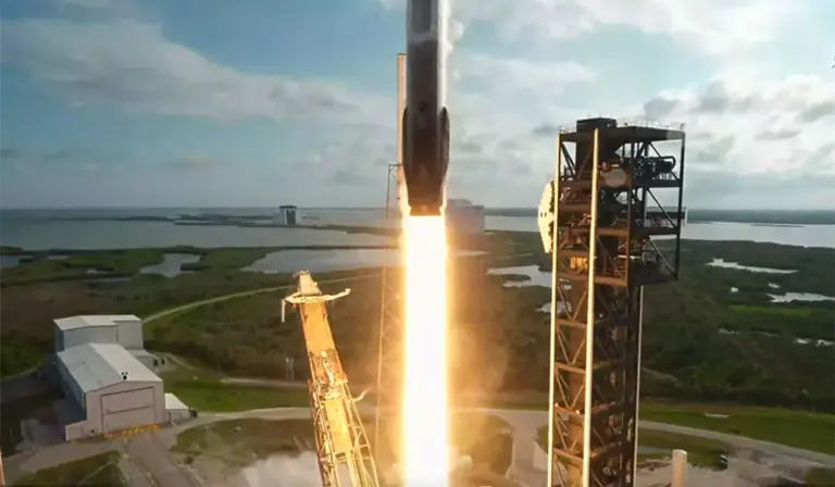 A SpaceX Falcon 9 topped with a cargo Dragon spacecraft...