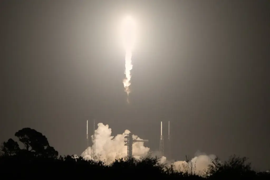 A SpaceX Falcon 9 rocket with a crew of four...