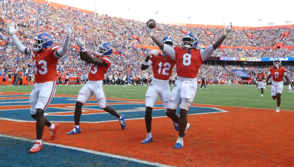 Florida linebacker Aaron Chiles (8) celebrates after recovering a fumble...