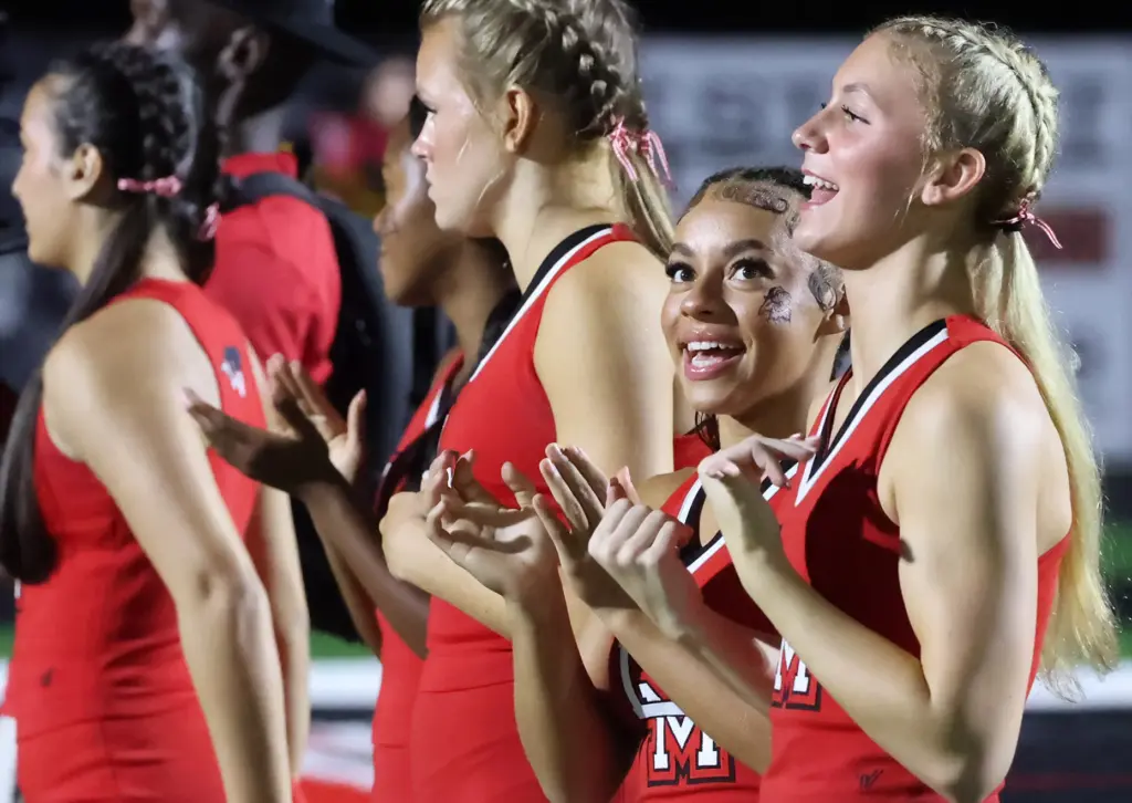Cheerleaders cheer during the Osceola High at Lake Mary High...