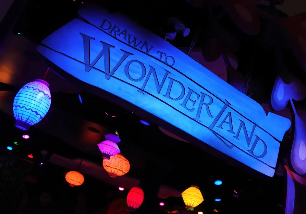 Signage for the Drawn To Wonderland playground at a preview...
