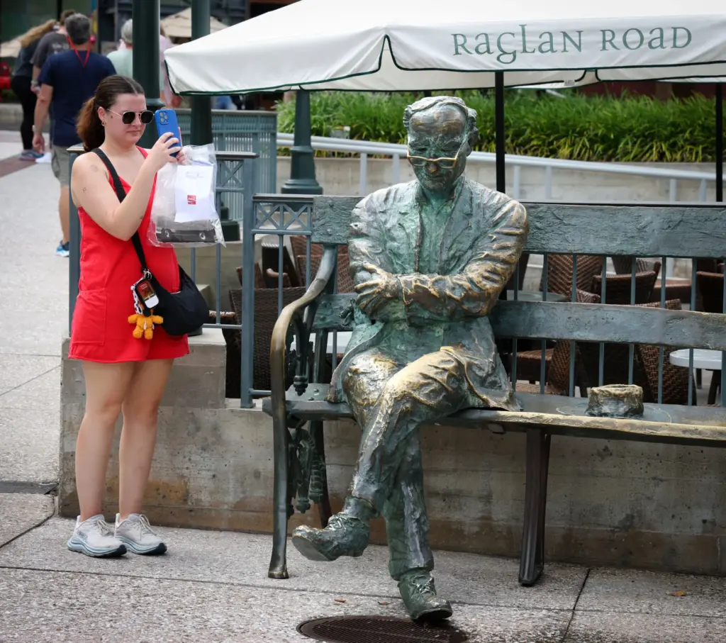 14th HOOLEY AT DISNEY â A guest snaps a photo...
