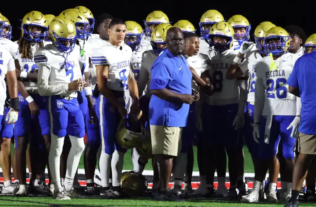 Osceola head coach Eric Pinellas coaches players during the Osceola...