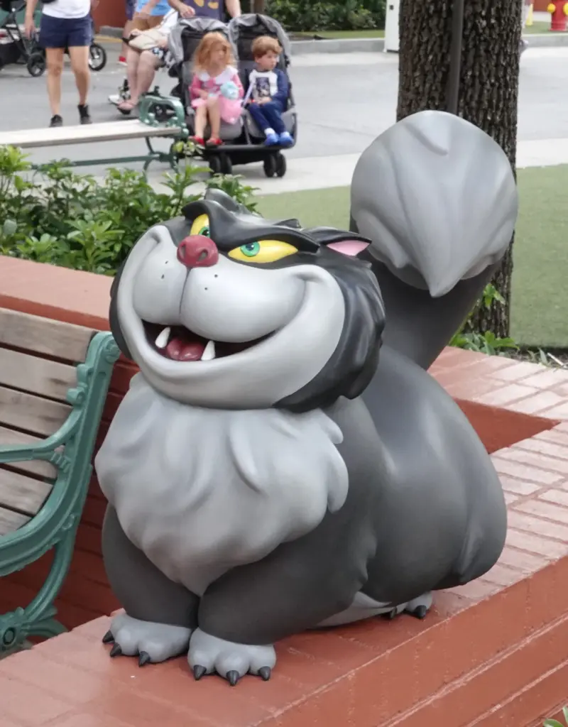 A toddler-sized Lucifer from âCinderellaâ keeps an eye on young...