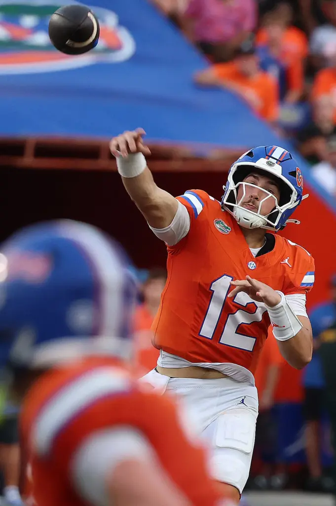 Florida qurterback Aaron Philo throws during the Campbell University at...