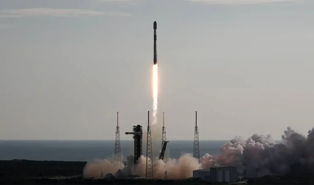 A SpaceX Falcon 9 carrying 29 Starlink satellites launches from...