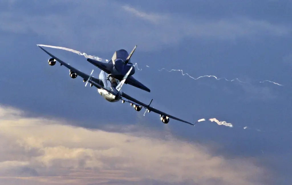 A modified 747 jumbo jet carrying Space Shuttle Endeavour piggyback...