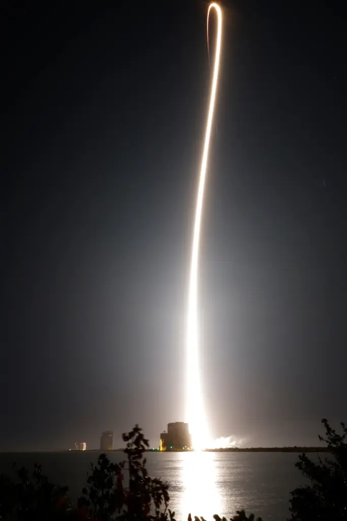 A SpaceX Falcon 9 rocket with a crew of four...