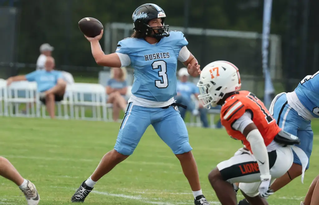 Hagerty quarterback Royce Jenkins throws during the Oviedo High at...