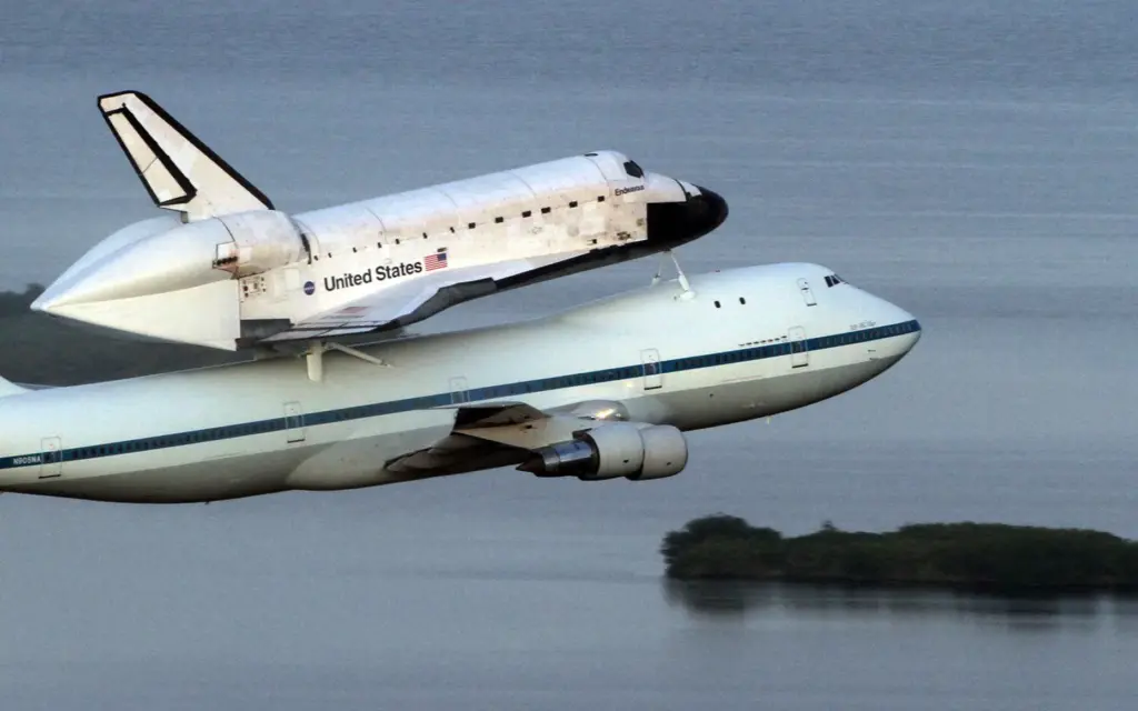 A modified 747 jumbo jet carrying Space Shuttle Endeavour piggyback...