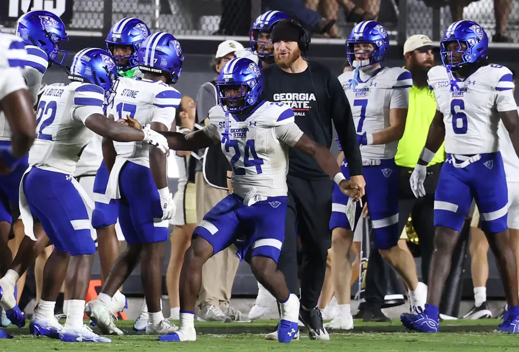 Georgia State running back Qwantavius Wiggins (24) celebrates after a...
