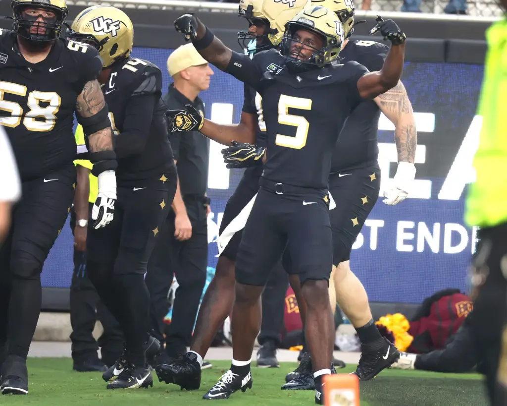 UCF receiver Josh Derry (5) celebrates after a touchdown during...