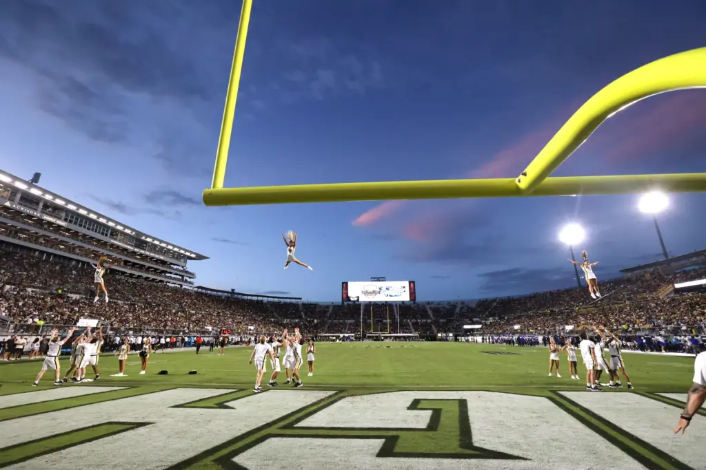 UCF cheerleaders perform during the Georgia State at UCF football...