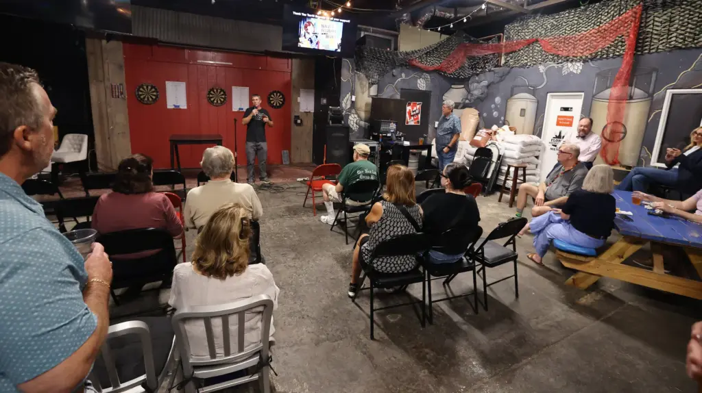 Mike Wallace, Ten10 Brewing owner, speaks during the Pints With...
