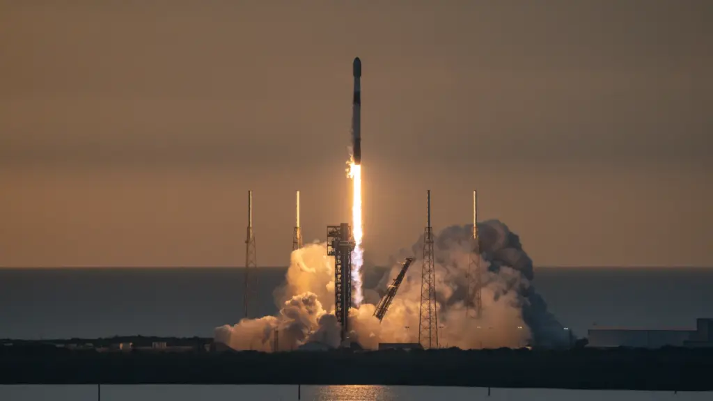 A SpaceX Falcon 9 on a Starlink mission launches at...