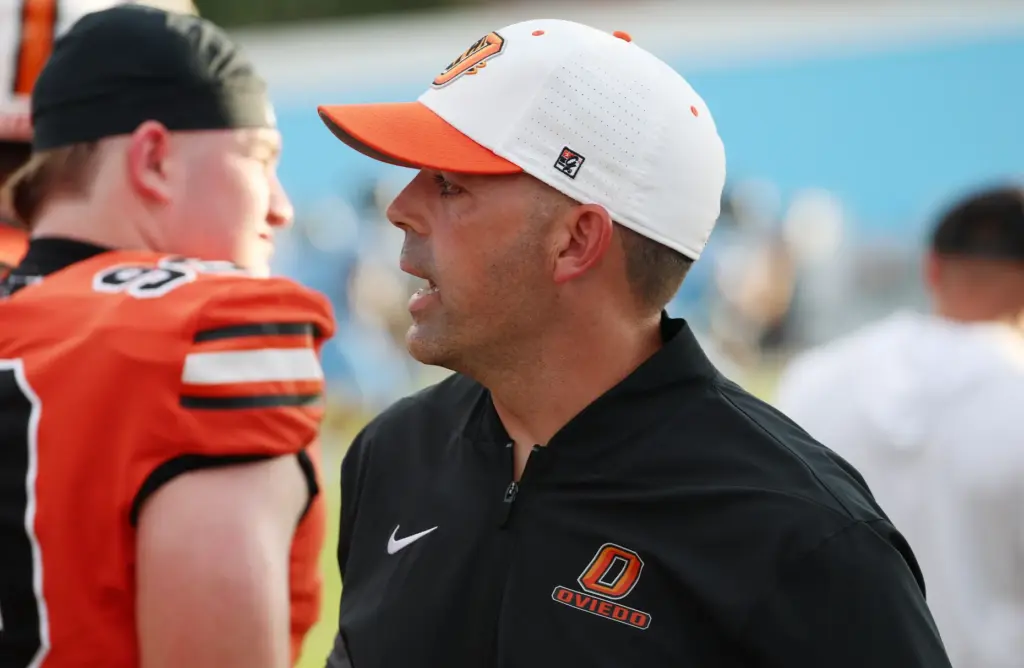 Oviedo coach Greg Odierno coaches during the Oviedo High at...