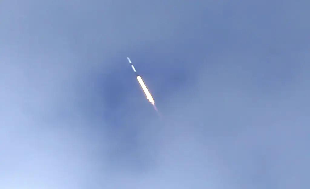 A SpaceX Falcon 9 rocket using a fleet-leading booster for...