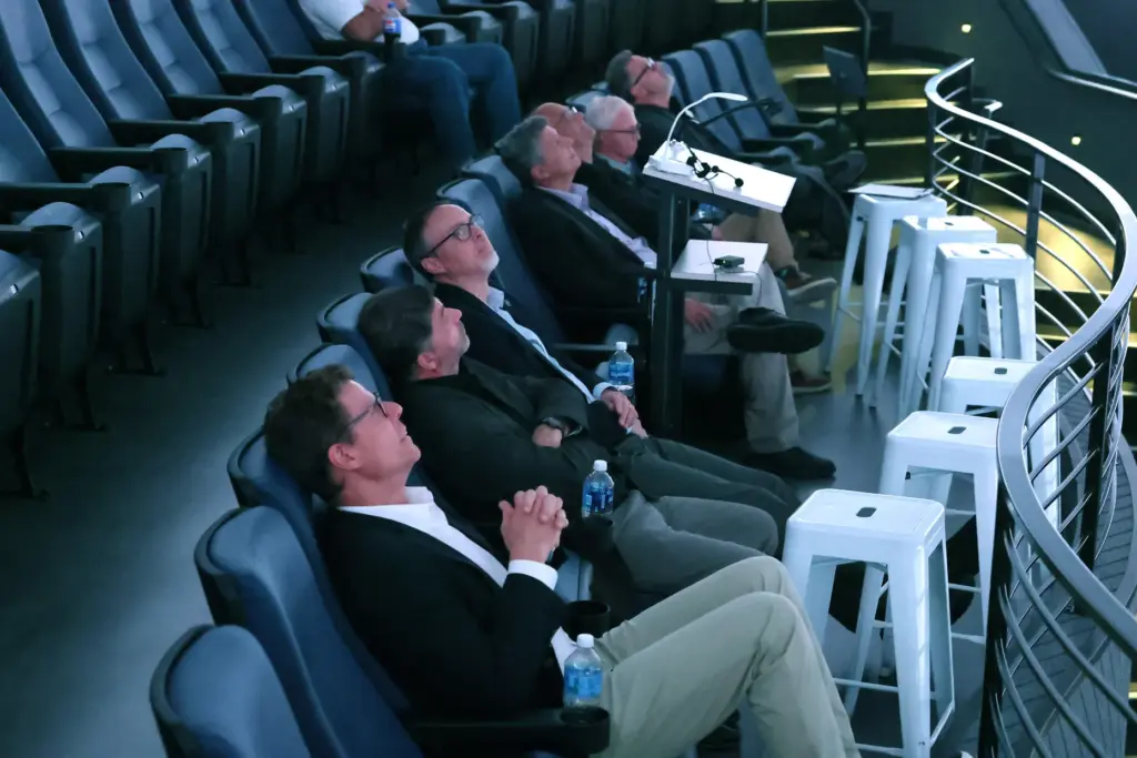Esteemed panel members watch during the Orlando Sentinel presentation of...