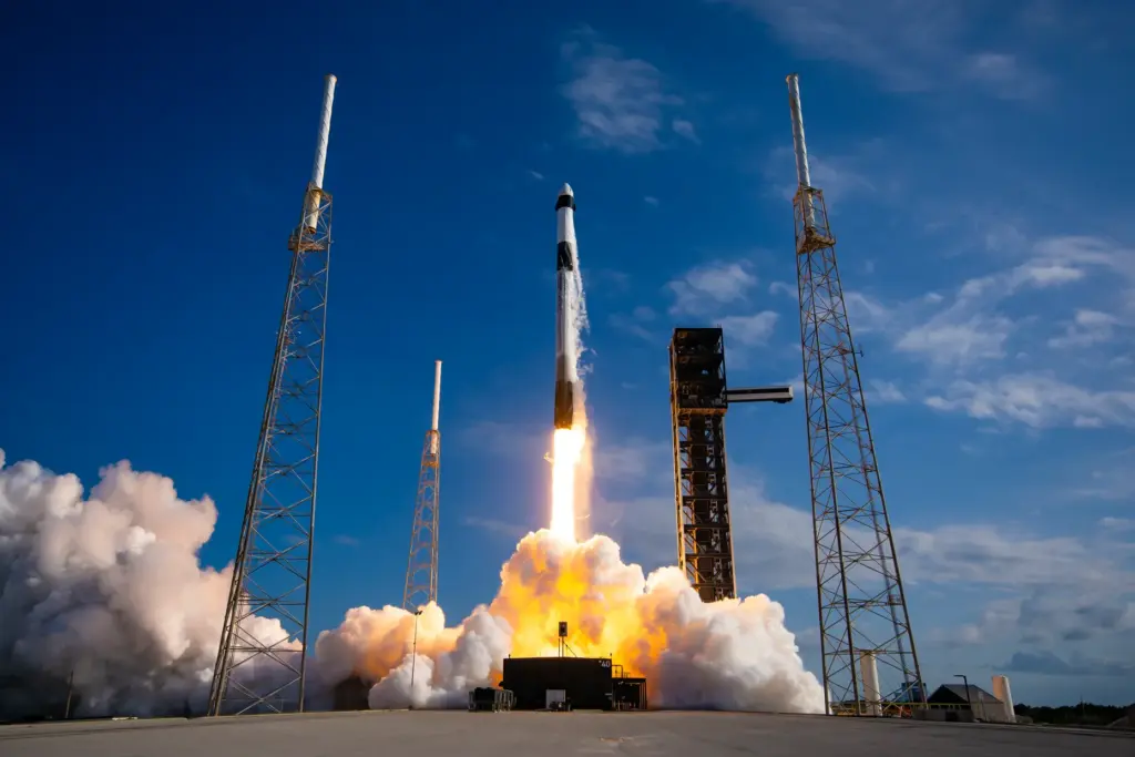 A SpaceX Falcon 9 topped with a cargo Dragon spacecraft...