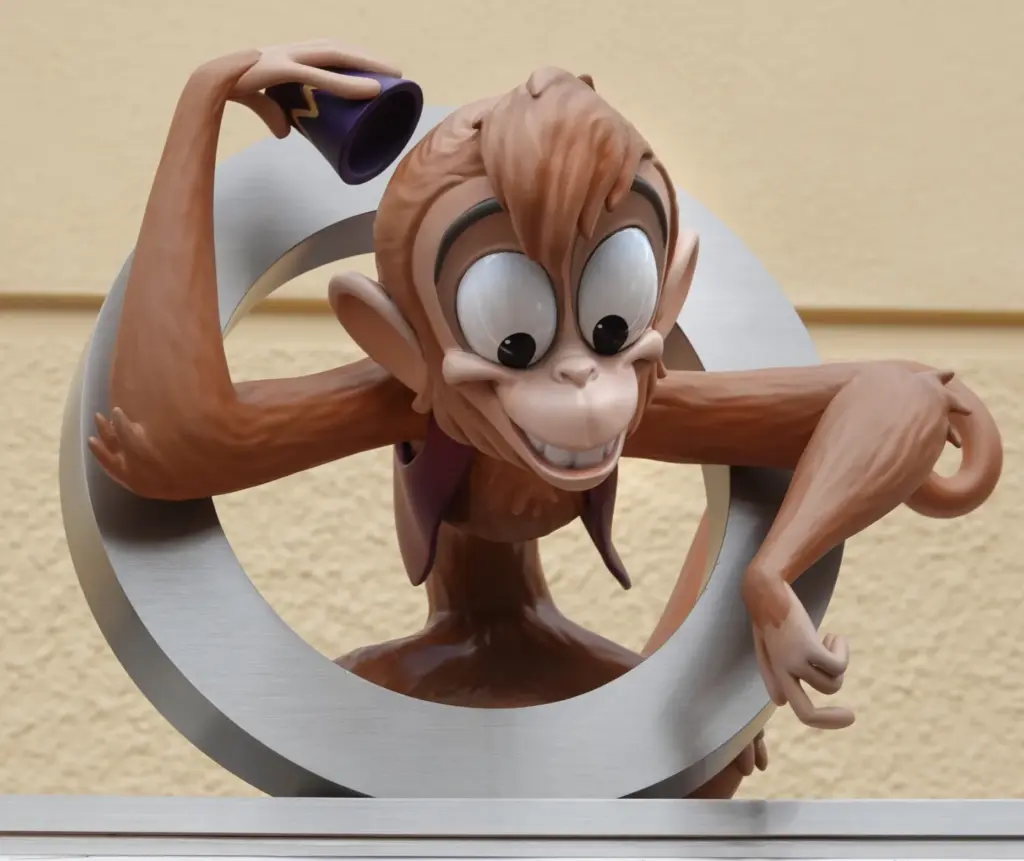 A toddler-sized Abu from âAladdinâ keeps an eye on the...