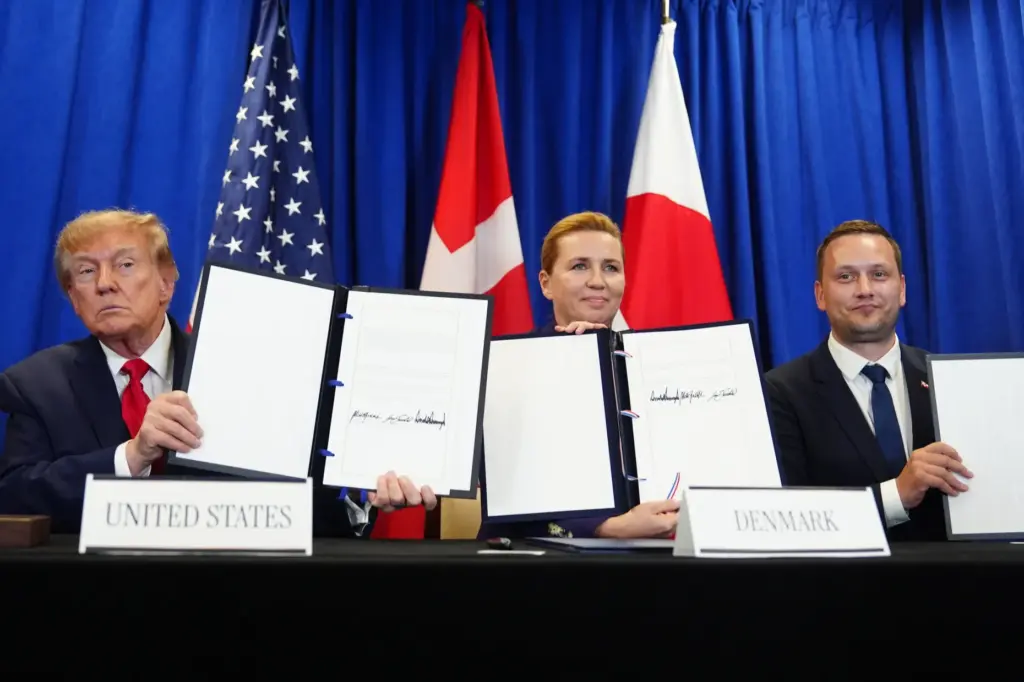 President Donald Trump signs a security agreement with Denmark’s Prime...
