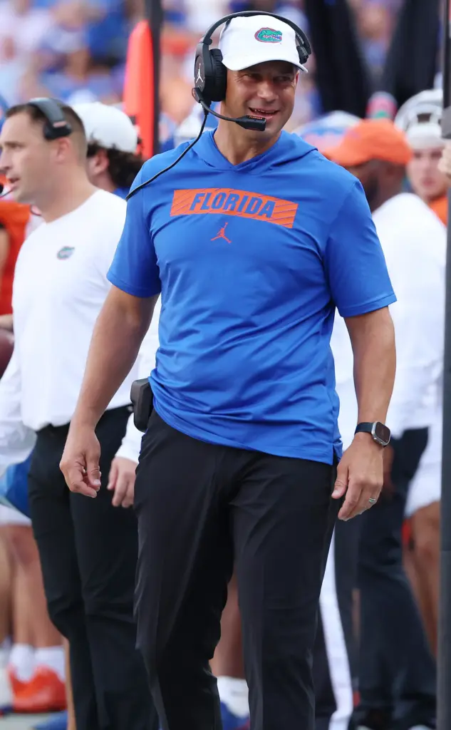 Florida coach Jon Sumrall smiles during the Campbell University at...