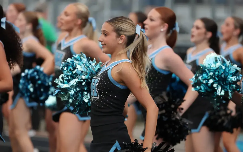 Cheerleaders cheer during the Oviedo High at Hagerty High varsity...
