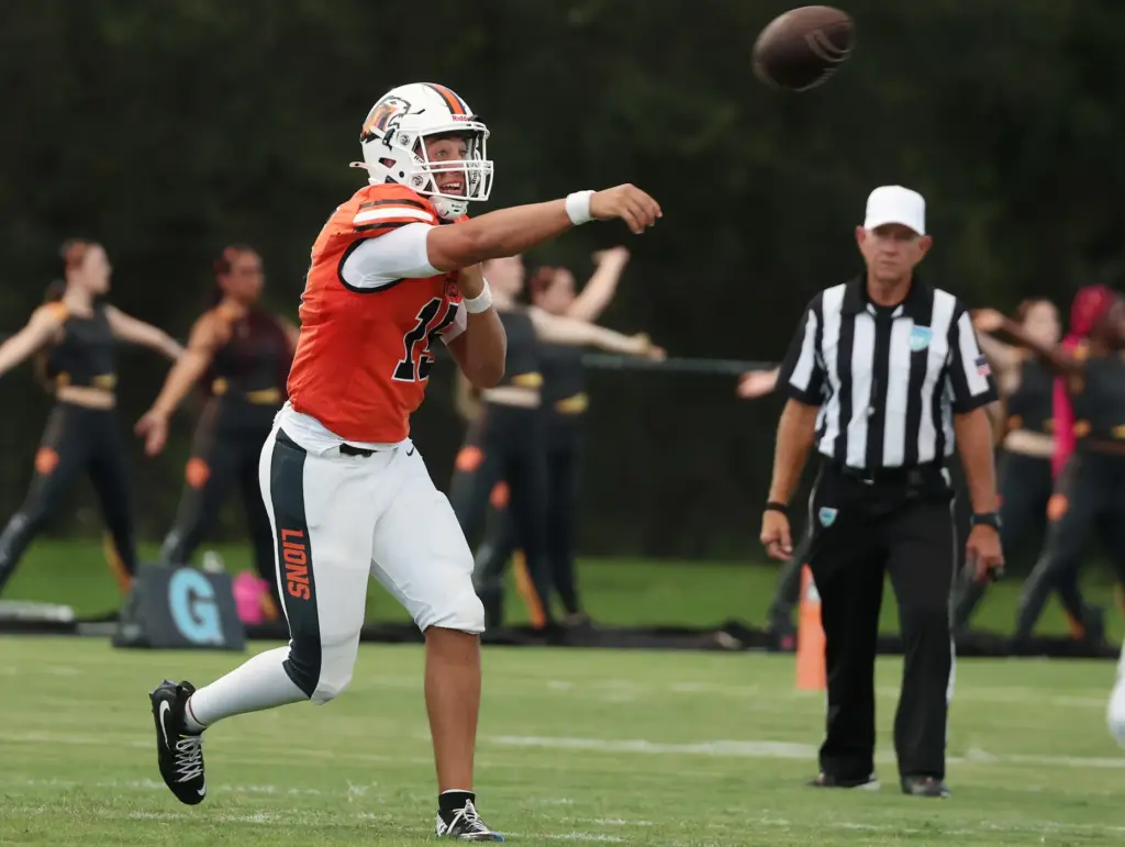Oviedo quarterback Sebastian Galeano throws during the Oviedo High at...