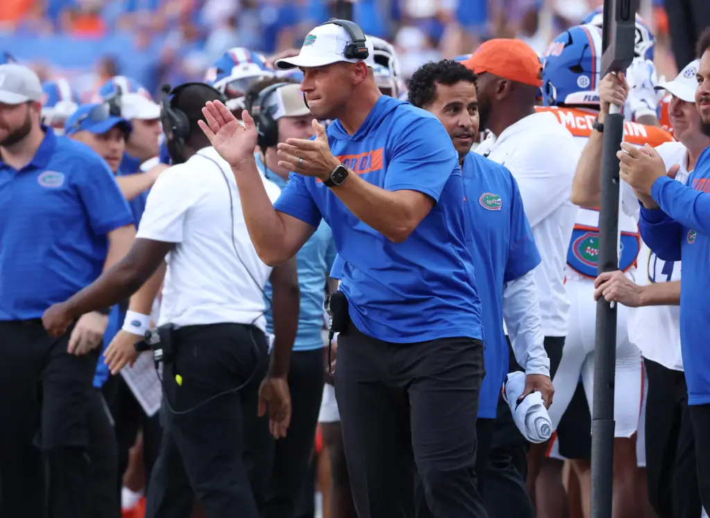 Florida head coach Jon Sumrall celebrates during the Campbell University...