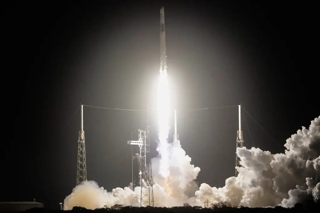 A SpaceX Falcon 9 rocket with a crew of four...