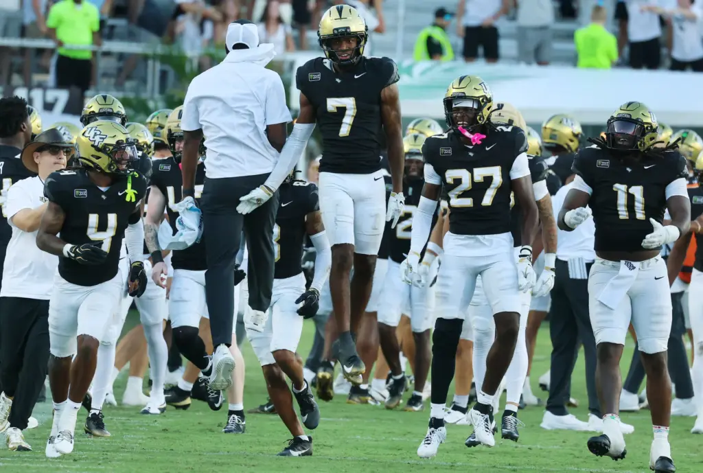 UCF defensive back Antione Jackson (7) leaps in celebration after...