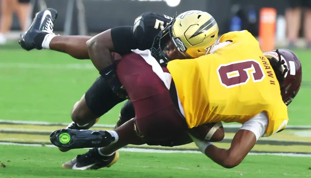UCF defensive back Jayden Williams (2) puts a hard hit...