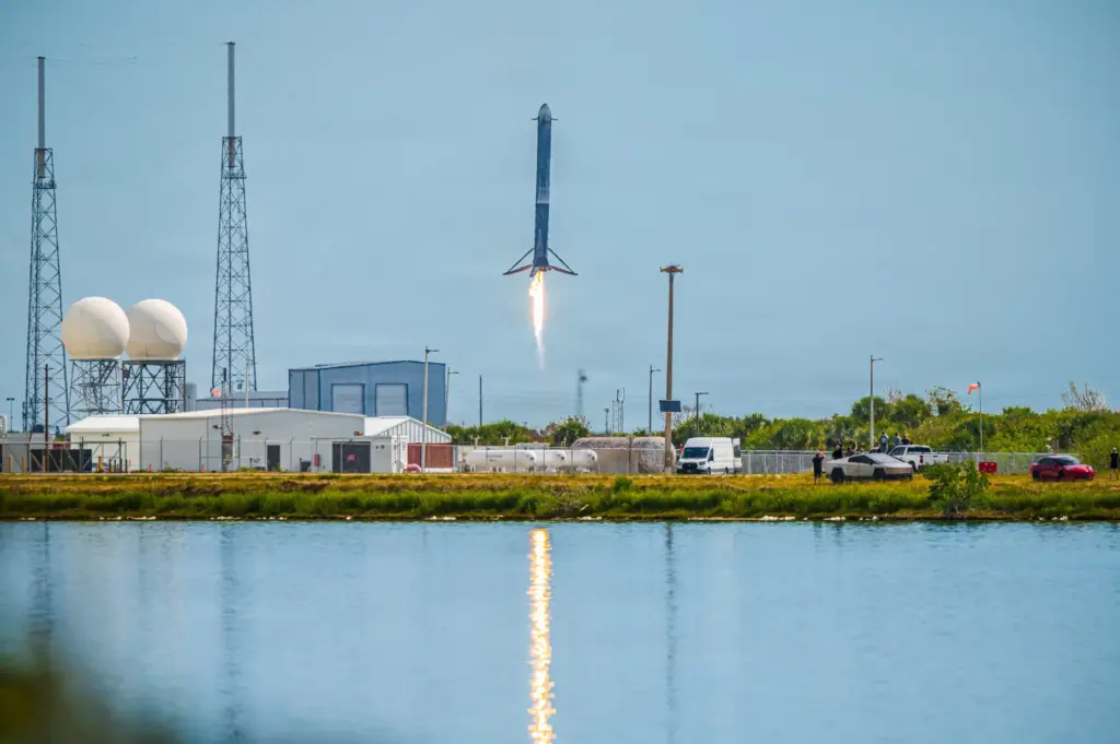 A SpaceX Falcon Heavy booster that launched from Kennedy Space...