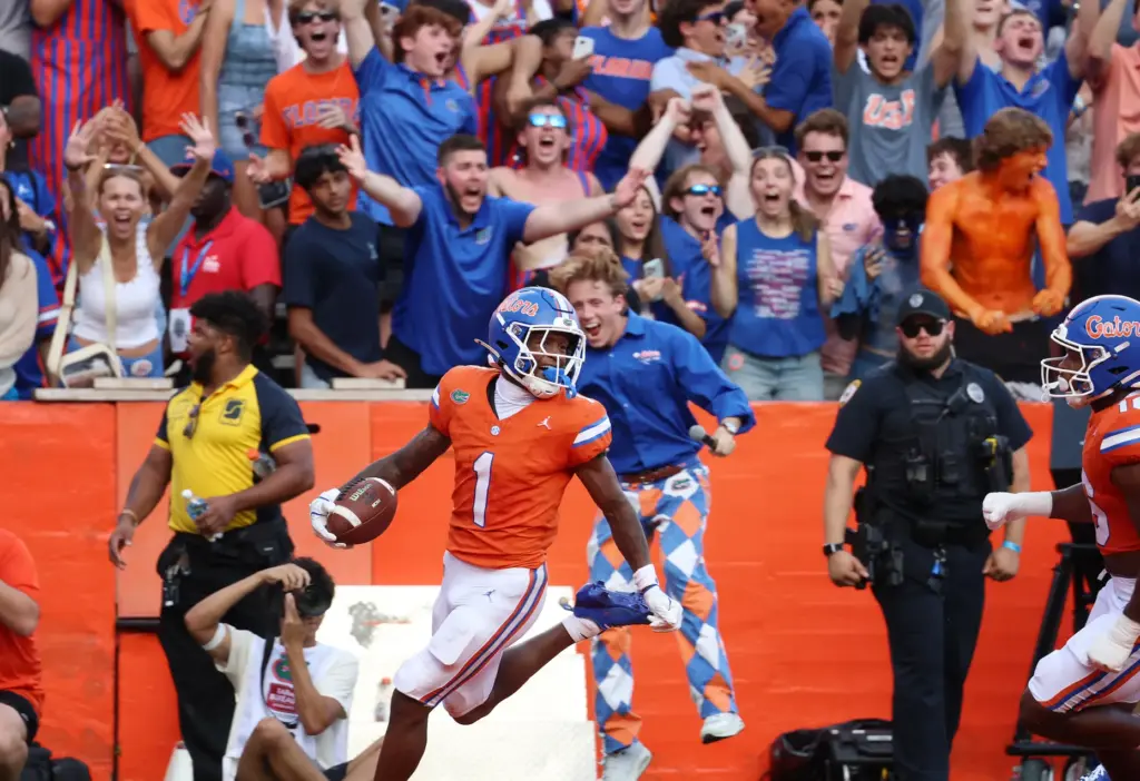 Florida receiver Vernell Brown III (1) returns a punt for...