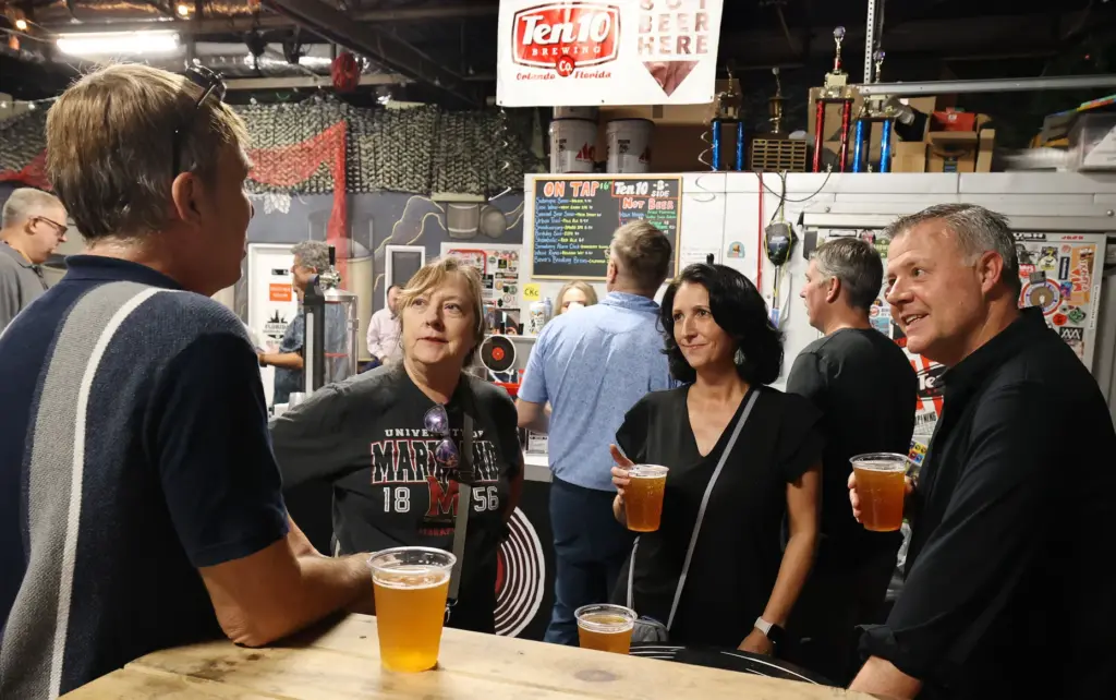 Attendees gather during the Pints With The Press event at...