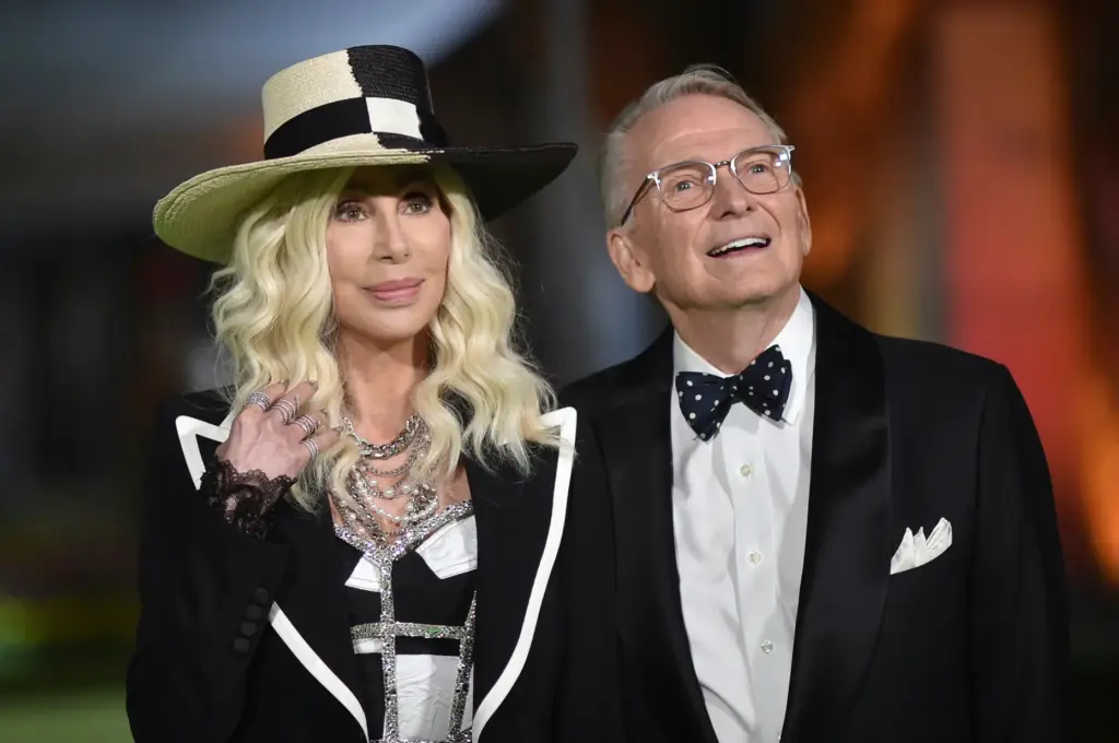 FILE – Cher, left, and designer Bob Mackie arrive at...