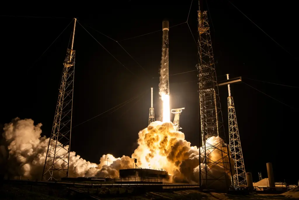 A SpaceX Falcon 9 carrying three communications satellites for AST...