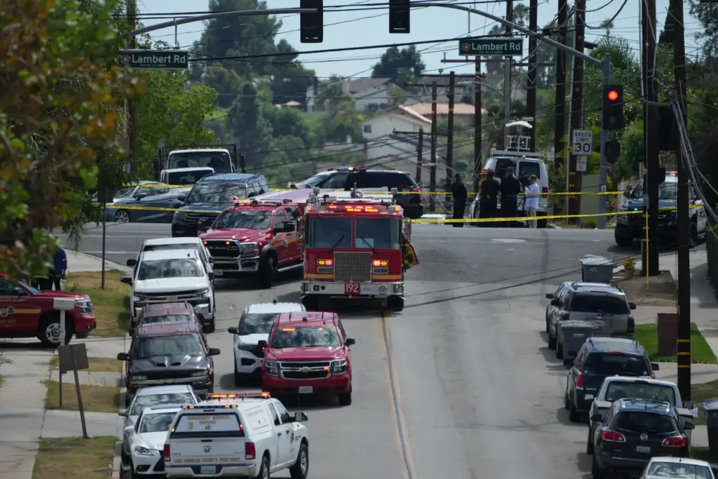 Firetrucks blocked off roads following a reported chemical leak, Tuesday,...