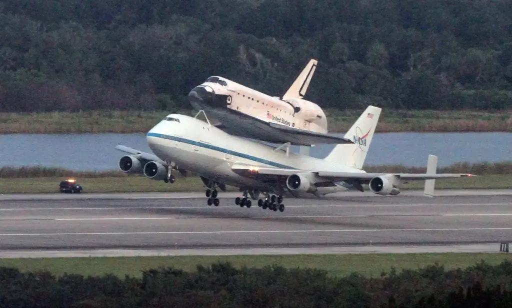 A modified 747 jumbo jet carrying Space Shuttle Endeavour piggyback...
