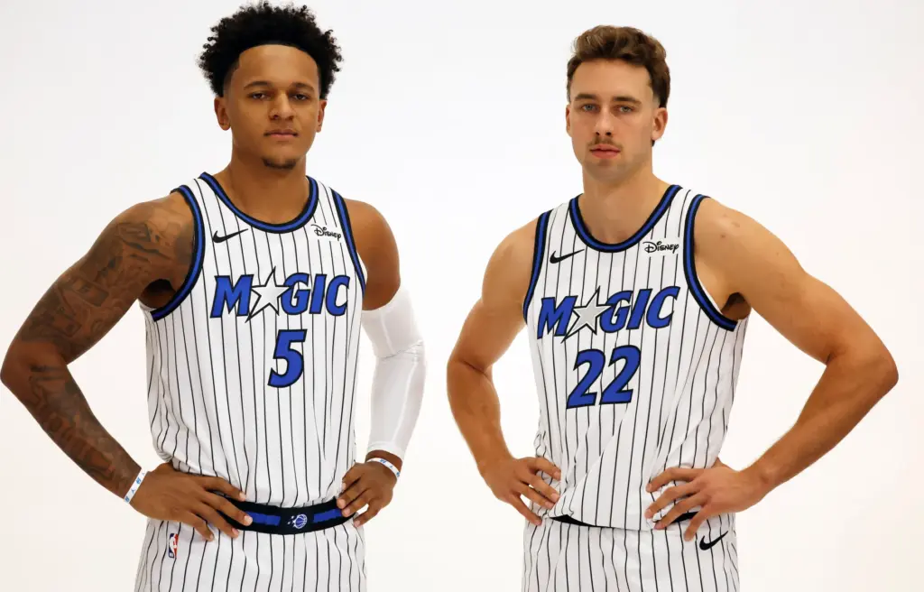 Left to Right, Orlando Magic Forwards Paolo Banchero (5) and...