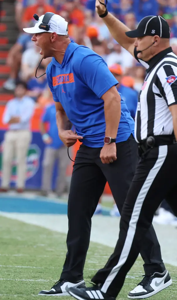 Florida head coach Jon Sumrall yells during the Campbell University...