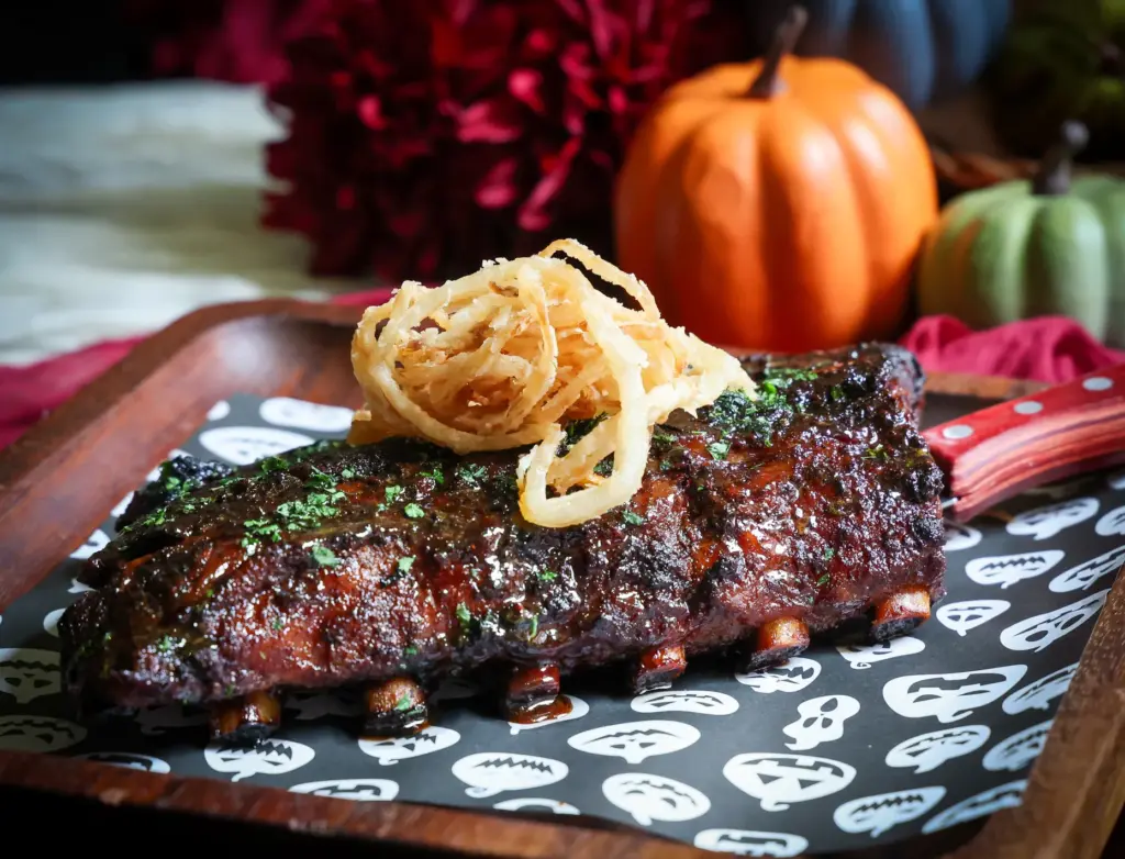 14th HOOLEY AT DISNEY â A half-rack of slow-cooked pork...